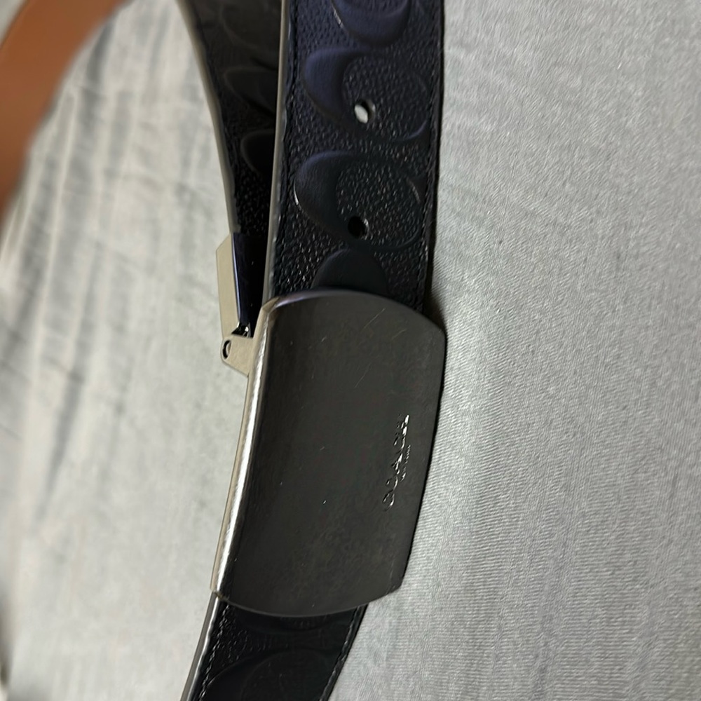 Coach plaque buckle cut to size reversible belt 42”. Black/brown